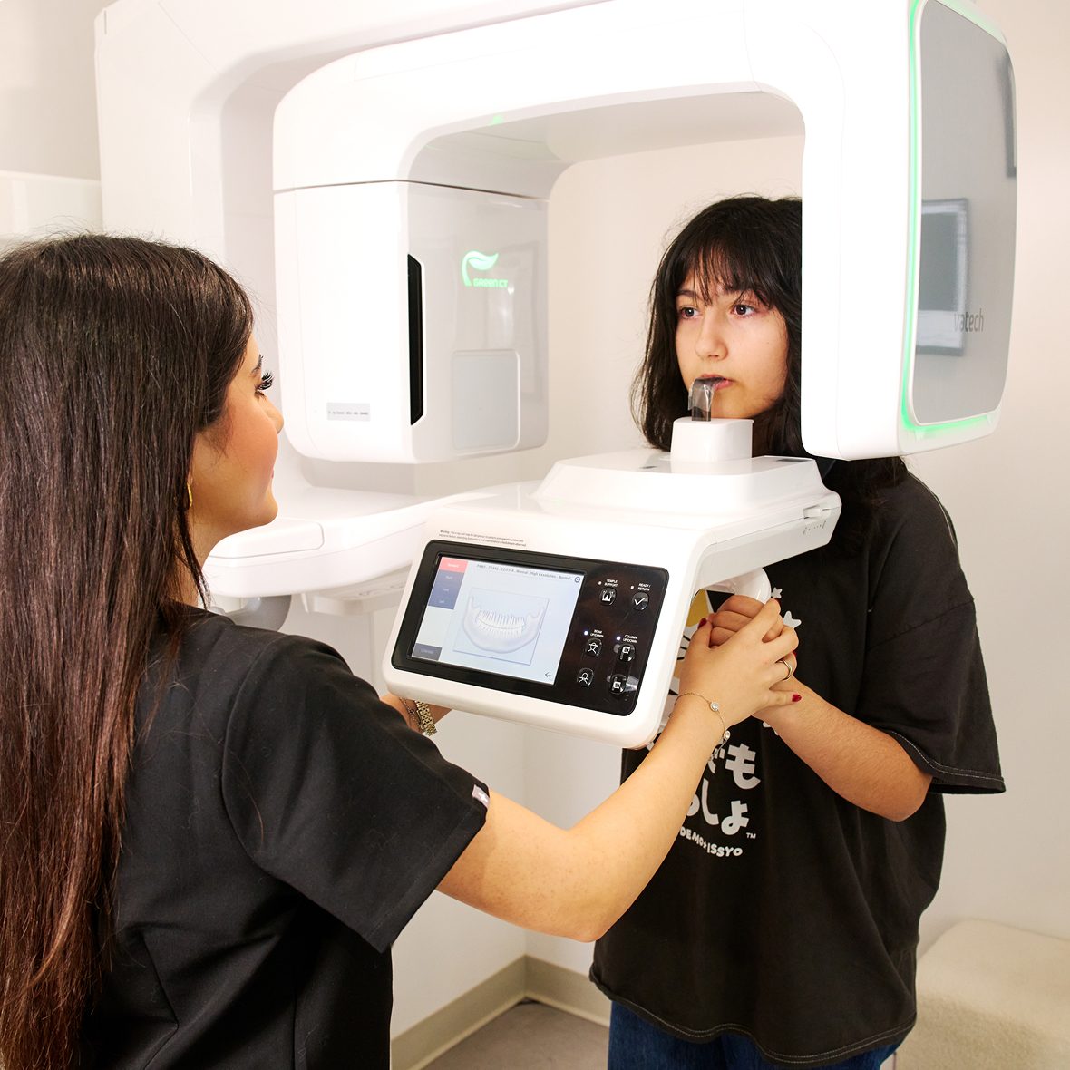 Patient undergoing dental X-ray scan at Mia Orthodontics in Houston.